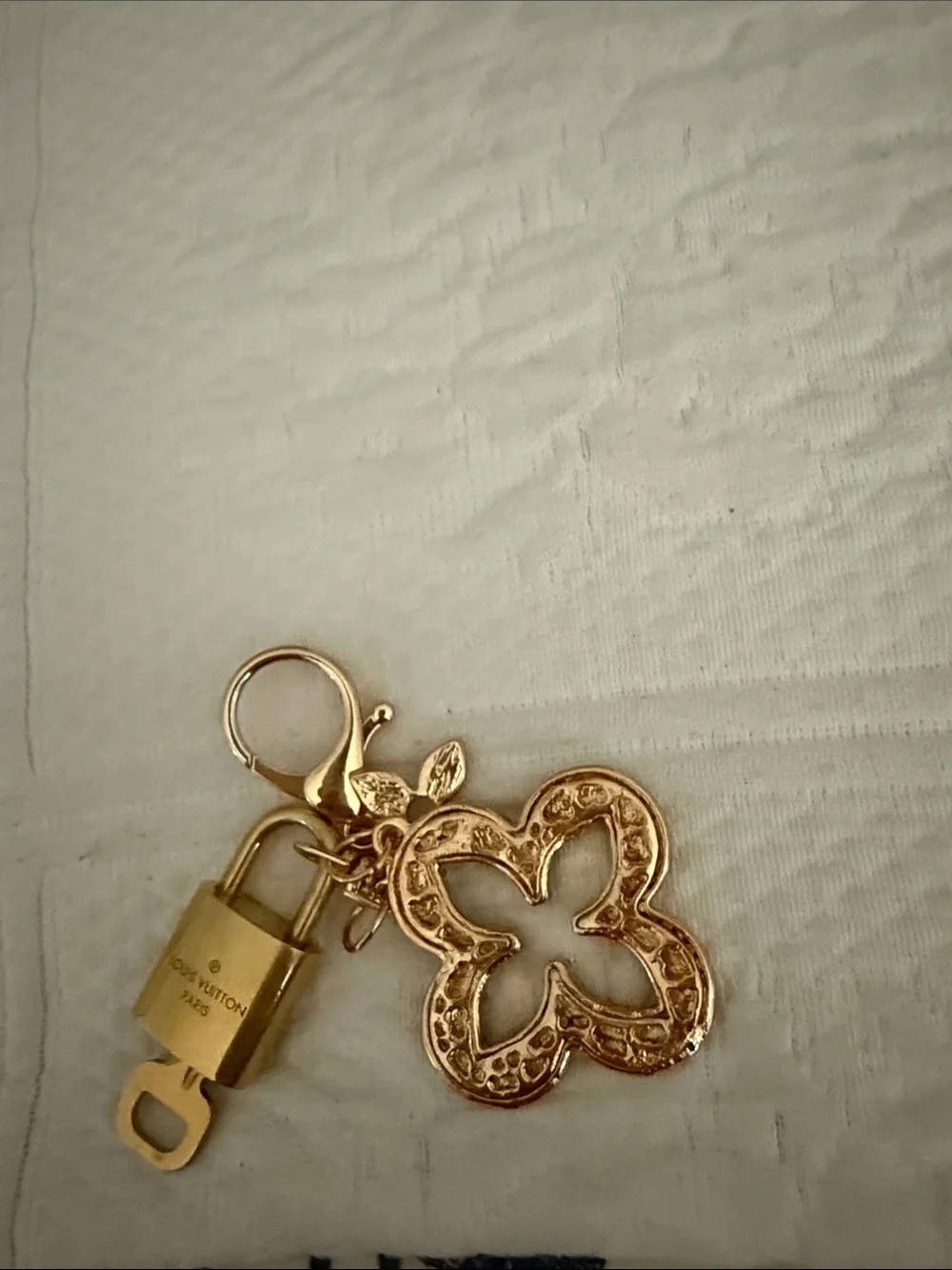 Louis Vuitton lock and key with unbranded gold and White Crystal Flower Charm